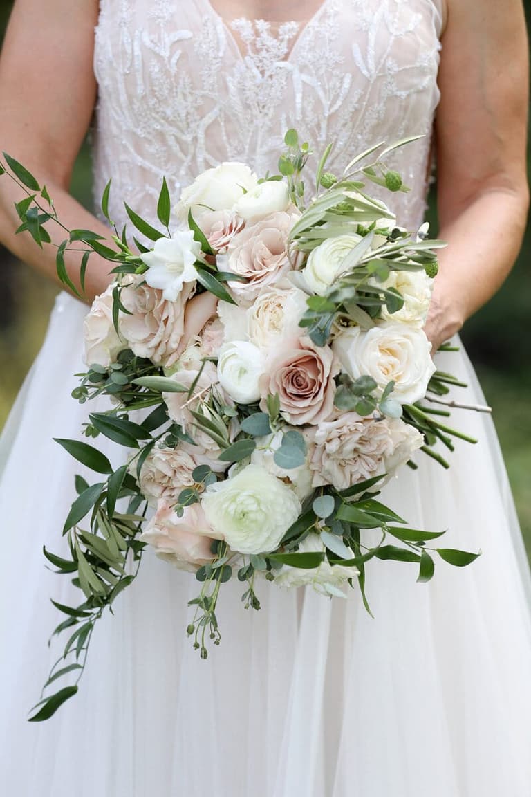 Bride holding bouquet of flowers at her Sooke wedding