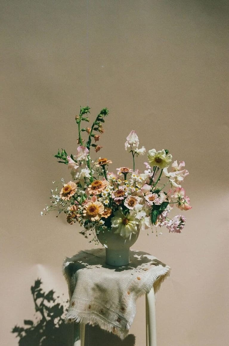 Wedding bouquet sitting on stand for a golf island wedding